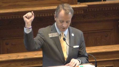 Georgia state Sen. John Albers, R-Roswell, shows a purple wristband he wore on Feb. 26, 2021, in honor of Max Gruver, a teenager from his area who died in a fraternity hazing incident in 2017. Albers has introduced legislation that strengthens criminal penalties for hazing convictions and requires more public disclosure of such incidents. (Courtesy of Georgia Legislature)