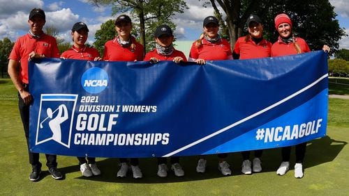 Georgia coach Josh Brewer (L) and members of the Bulldogs' women's golf team pose with the NCAA Columbus Regional banner after blowing away the field over three days win the regional at Ohio State's Scarlett Course to advance to the NCAA Championships next week in Scottsdale, Ariz. (Photo from UGA Athletics)