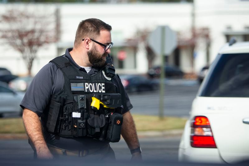 Officer Jacob Baird of the Lawrenceville Police Department patrols the city on Monday, November 14, 2022, in Lawrenceville, Georgia. The department created Project F.I.R.S.T., a partnership with View Point Health. CHRISTINA MATACOTTA FOR THE ATLANTA JOURNAL-CONSTITUTION