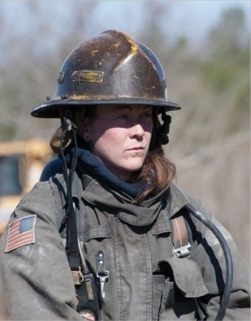 Cherokee County firefighter Grace Robertson wears bunker gear at the Georgia F.LA.M.E.S. course site. CONTRIBUTED BY ANGELA RICE
