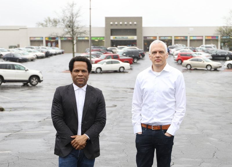 Tech investor and entrepreneur Donray Von, left, and Atlanta Beltline mastermind Ryan Gravel talk to reporters at the Mall West End in Atlanta on Friday, March 15, 2019. The duo are in the process of acquiring the mall to develop it. 