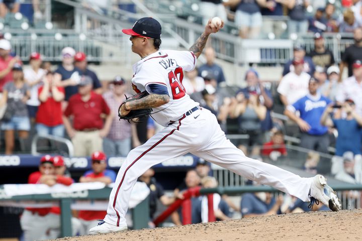 Braves reliever Jesse Chavez delivers during the ninth inning against the Phillies on Sunday at Truist Park. (Miguel Martinez / miguel.martinezjimenez@ajc.com)