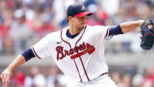 Braves pitcher Charlie Morton delivers against the Padres on Saturday at Truist Park. (AP Photo/Brynn Anderson)