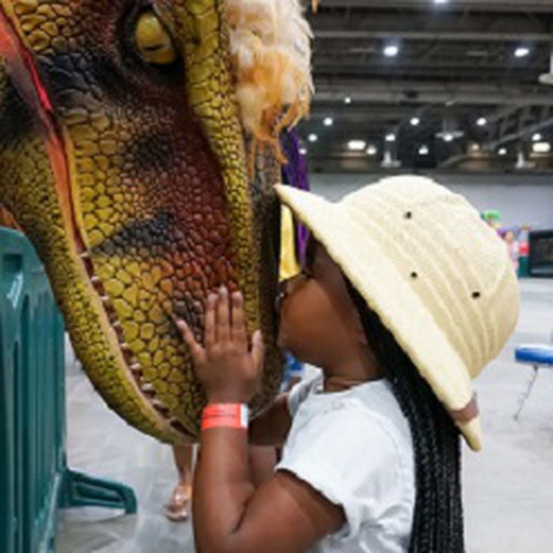 See life-size animatronic dinosaurs including the 50-foot long megalodon at the Georgia World Congress Center.