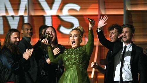 LOS ANGELES, CA - FEBRUARY 12: Recording artist Adele, winner of Album of the Year for '25,' speaks onstage during The 59th GRAMMY Awards at STAPLES Center on February 12, 2017 in Los Angeles, California. (Photo by Kevork Djansezian/Getty Images)