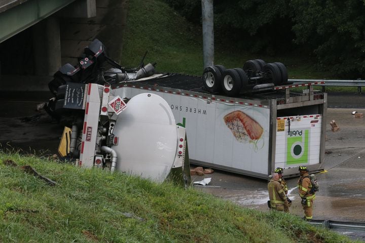 I-285 crash: Trucks plunge off interstate onto Ga. 400