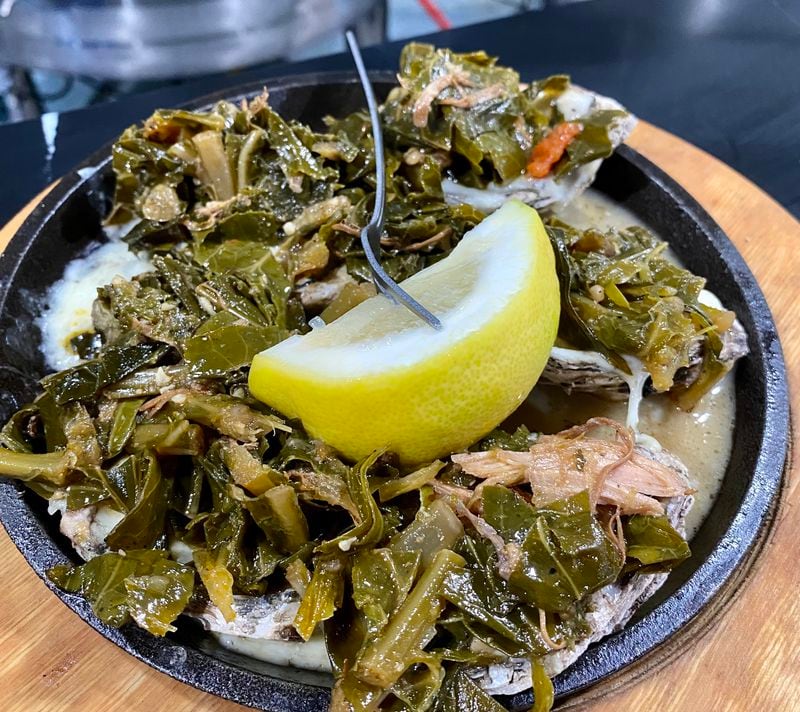 Hippin Hops’ Oysters Collardfeller are a riff on the classic Oysters Rockefeller; the baked bivalves use collards instead of spinach. (Wendell Brock for The Atlanta Journal-Constitution)