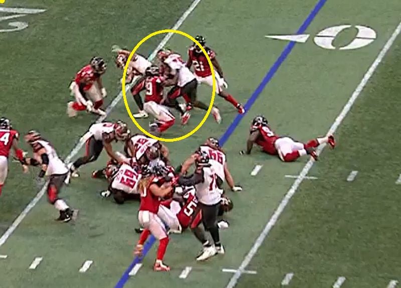 Falcons strong safety Jordan Richards meets Peyton Barber in the hole, but gets ran over and takes out Brian Poole in the process. The box safety is supposed to deliver the blows. Not take them. 