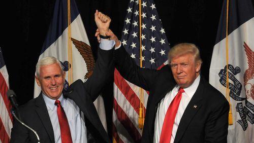 DES MOINES, IA - AUGUST 5 : Republican Presidential Candidate Donald Trump and Vice Presidential candidate, Indiana Governor Mike Pence greet supporters at a rally at the Iowa Events Center in Des Moines, Iowa on Friday August, 5, 2016. (Photo by Steve Pope/Getty Images)