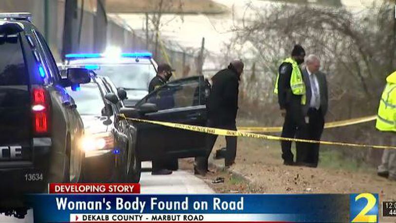 A body was found Monday morning on Marbut Road in Lithonia. (Credit: Channel 2 Action News)