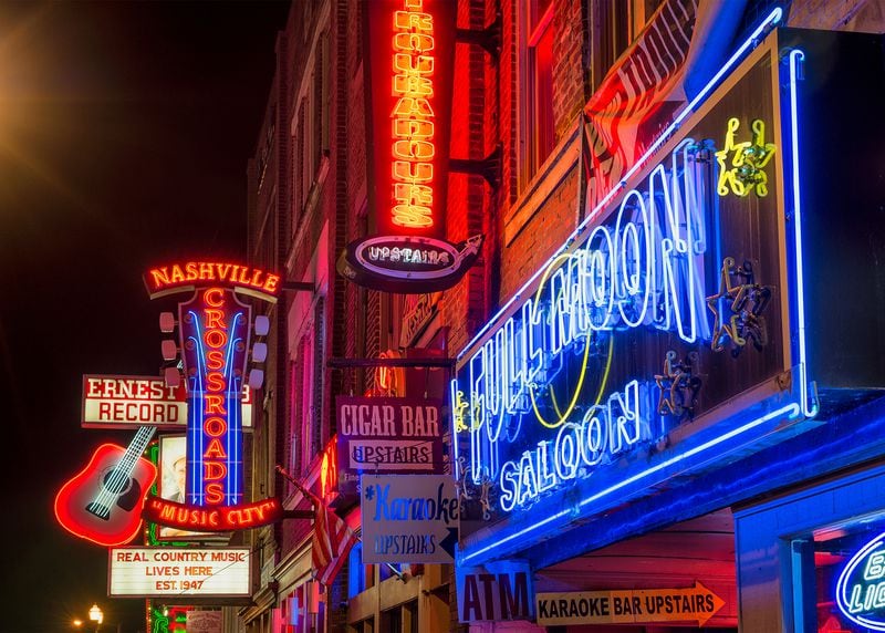 City of Atlanta officials and music luminaries recently toured the neon lights along music row in downtown Nashville during an exploratory visit to understand Nashville's music ecosystem and how a similar district might be created in Atlanta.  (Dreamstime/TNS)