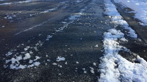 <p>Drivers on icy roads in Cobb County</p> <p>Ice remained on roads in Paulding County days after snow hit metro Atlanta.</p> <p>Black ice in Atlanta Sunday, Dec. 10, 2017</p> <p>Black ice in metro Atlanta Sunday, Dec. 10, 2017</p> <p>Black ice is forming across metro roads, causing headaches on many roadways.&nbsp;</p> <p>Secondary and neighborhood roads are the biggest&nbsp;concerned on which black ice may form.&nbsp;</p> <p>Plummeting temperatures cause re-freeze concerns Sunday morning.&nbsp;</p>