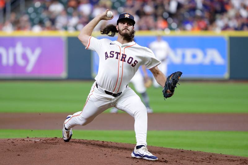Houston Astros starting pitcher Spencer Arrighetti throws against the Atlanta Braves during the first inning of a baseball game Monday, April 15, 2024, in Houston. (AP Photo/Michael Wyke)