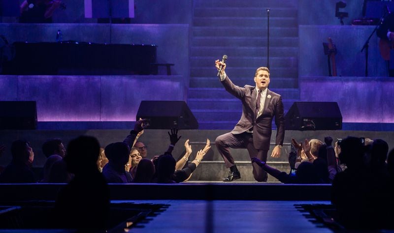 Michael Buble hams it up for the crowd at Infinite Energy Arena on Feb. 17, 2019. Photo: Ryan Fleisher/Special to the AJC