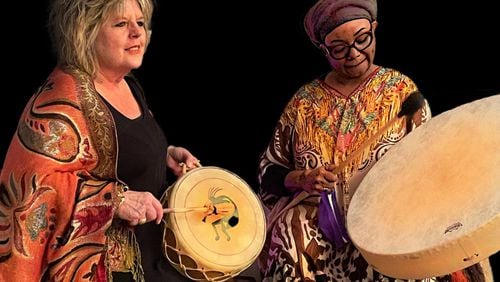 A recent full (wolf) moon drum circle celebration at The Well of Roswell. The celebration is a time of releasing things that no longer serve you. Shown are (L) co-owner Becky Arrington and Shylika Glickman.