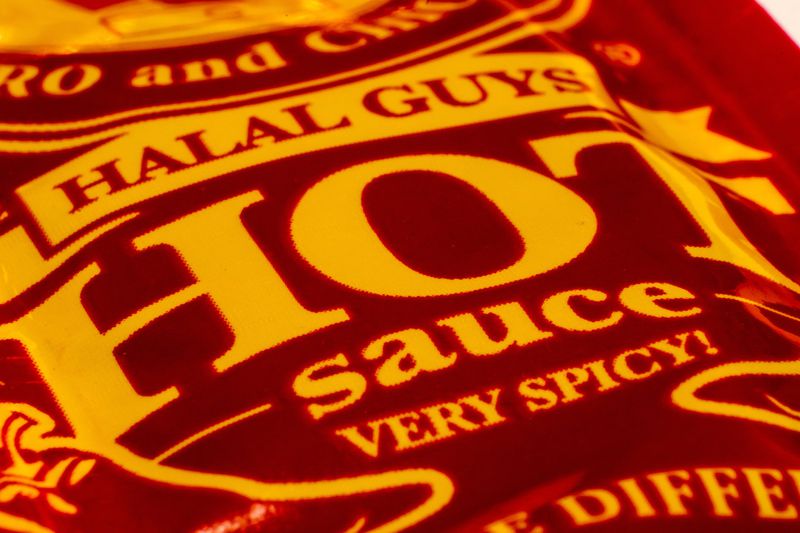 The red sauce served by the Halal Guys is best handled with extreme caution. CONTRIBUTED BY HENRI HOLLIS