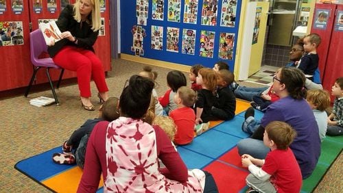 Georgia Department of Early Care and Learning Commissioner Amy M. Jacobs visits a licensed child care center at Georgia State University in 2018. She announced on Monday that Georgia is expanding its childcare subsidy.