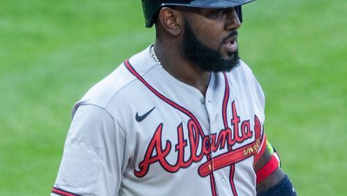 Right sleeve on the jersey of Atlanta Braves Marcell Ozuna (20) with covered All Star patch during the seventh inning of a baseball game against the Philadelphia Phillies, Saturday, April 3, 2021, in Philadelphia. (AP Photo/Laurence Kesterson)