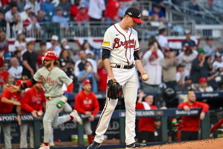 Atlanta Braves starting pitcher Max Fried (54) reacts as Philadelphia Phillies base runner Bryce Harper scores on a home run by J.T. Realmuto during the third inning of the NLDS Game 2 in Atlanta on Monday, Oct. 9, 2023.   (Hyosub Shin / Hyosub.Shin@ajc.com)