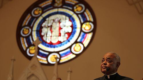 Archbishop Wilton Gregory, seen here on Good Friday 2016 at the Shrine of the Immaculate Conception Catholic Church. TAYLOR CARPENTER / TAYLOR.CARPENTER@AJC.COM