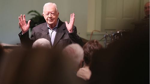 President Jimmy Carter talks to the overflow crowd at Maranatha Baptist Church in Plains on Sunday morning Aug. 23, 2015, before teaching Sunday school.