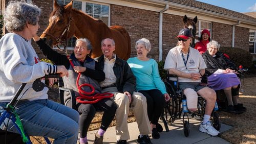 Seniors from Addington Place Assisted Living & Memory Care participate in a therapy session in Joyous Acres’ Seniors for Seniors program. (Courtesy of Joyous Acres)