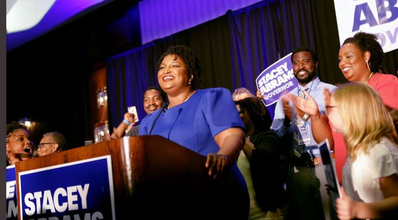 Democratic Leader Stacey Abrams, winner of gubernatorial Primary Election Night , basks in the glow of joy of supporters, volunteers, community members at the Sheraton Atlanta, Tuesday, May 22, 2018. (Akili-Casundria Ramsess/Eye of Ramsess Media)