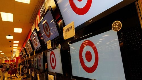 Flat-screen televisions with the Target logo are displayed in Target's Harlem store August 18, 2010 in New York City.