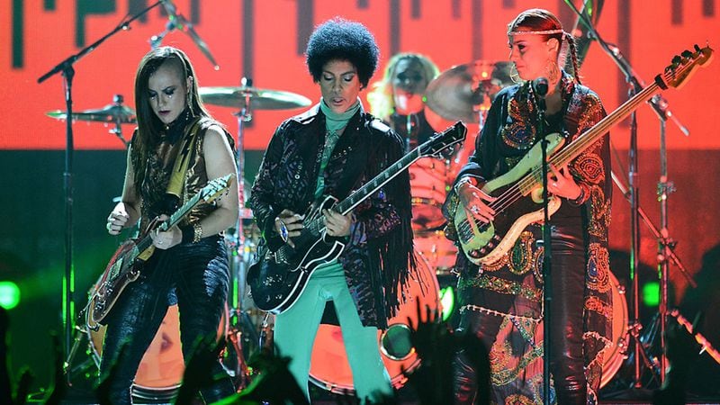 (L-R) Guitarist Donna Grantis, recording artist Prince and bassist Ida Nielsen perform onstage during the 2013 Billboard Music Awards at the MGM Grand Garden Arena on May 19, 2013 in Las Vegas, Nevada.
