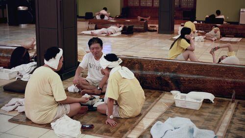 The Korean spa Wi Spa, seen here on December 11, 2012, is a family affair for immigrants and children of immigrants, who spend the night together on mats after bathing, playing video games, eating and otherwise relaxing. (Bethany Mollenkof/Los Angeles Times/TNS)
