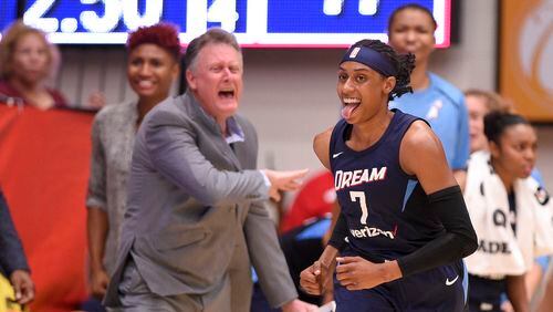Atlanta Dream guard Brittney Sykes (7) reacts after she scored during the second  half of Game 3 of a WNBA basketball playoffs semifinal against the Washington Mystics, Friday, Aug. 31, 2018, in Washington. (AP Photo/Nick Wass)