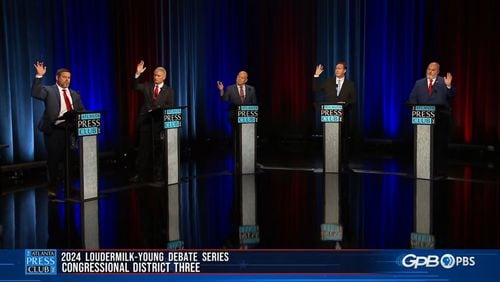 All five of the Republicans running in the Georgia 3rd Congressional District raise their hands on Sunday, April 28 during the Atlanta Press Club debate when asked if they think Donald Trump was the "rightful" winner of the 2020 election in Georgia. He lost that race to President Joe Biden, an outcome verified by recounts and investigations.