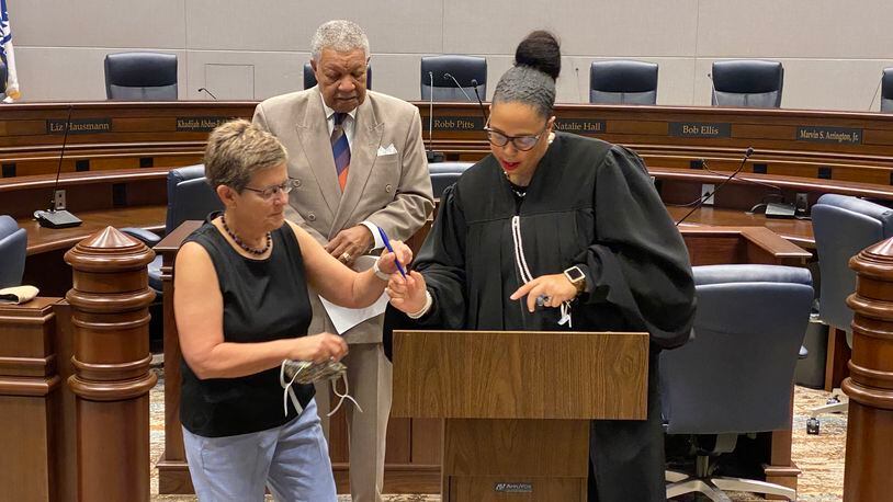 Cathy Woolard, former Atlanta City Council president, was sworn in Wednesday, Sept. 29, 2021 as chair of Fulton County’s board of registration and elections. (Ben Brasch/AJC)