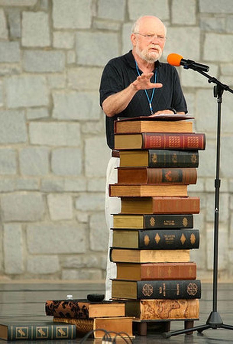 Terry Kay, a 2006 inductee into the Georgia Writers Hall of Fame, gives a speech on a stack of books during the inaugural 2010 Suwanee Festival of Books at the Suwanee Town Center Park in 2010.