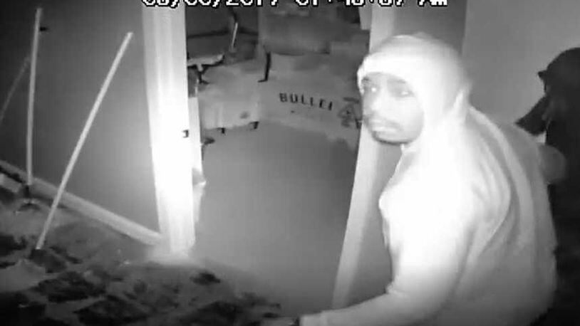 Police in Sandy Springs are searching for this suspect and a few others in relation to a liquor store burglary.