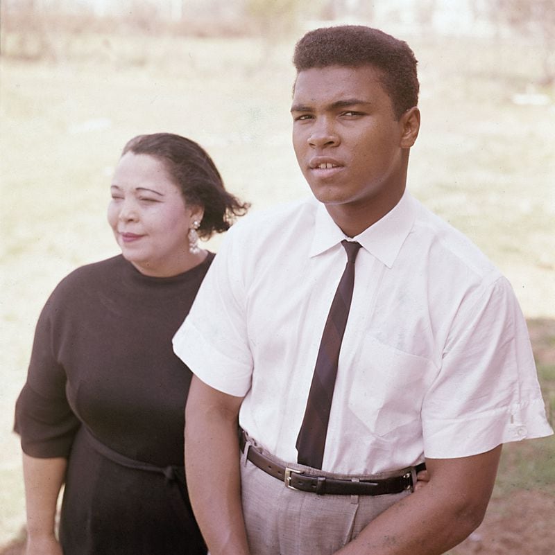 In this April 2, 1963, file photo, boxer Cassius Clay (Muhammad Ali) is seen with his mother, Odessa Grady Clay. Ali, the magnificent heavyweight champion whose fast fists and irrepressible personality transcended sports and captivated the world, has died according to a statement released by his family Friday, June 3, 2016. He was 74. (AP Photo)