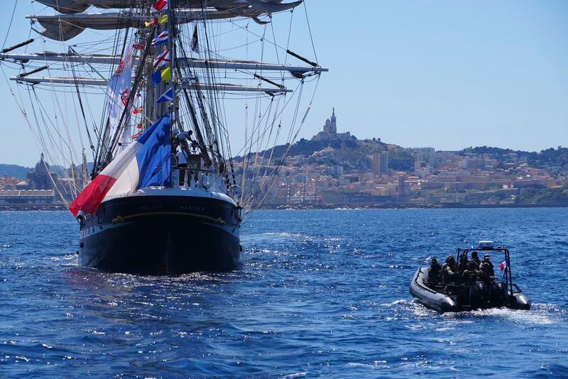 The Belem, the three-masted sailing ship which is carrying the Olympic flame, approaches Marseille, southern France, Wednesday, May 8, 2024. After leaving Marseille, a vast relay route is undertaken before the torch odyssey ends on July 27 in Paris. The Paris 2024 Olympic Games will run from July 26 to Aug.11, 2024. (AP Photo/Nicolas Garriga)
