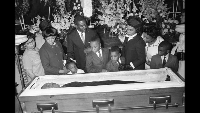  In this Sunday, April 8, 1968 file photo, Coretta Scott King, third right, is accompanied by her children, Yolanda, Bernice, Martin III, and Dexter at Sisters Chapel on the campus of Spellman College in Atlanta. Martin Luther King Jr.'s family joined thousands of mourners who filed by the casket of the civil rights leader. (AP Photo/Jack Thornell) 