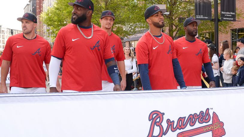 Braves outfielders Adam Duvall (from left), Marcell Ozuna, Alex Dickerson, Eddie Rosario and Guillermo Heredia walk the parade route during opening-day festivities Thursday at The Battery. Dickerson went hitless in the opening series against the Reds despite hitting several balls hard. (Daniel Varnado/for The Atlanta Journal-Constitution)