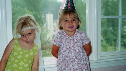 Brittany Feldman (left) and Kayla Canedo as toddlers. The two grew up together in north Fulton County. Feldman used this photo as her cover photo on Facebook. Her page was changed after their death to “Remembering Brittany Feldman.” Canedo’s page was also changed to “Remembering Kayla Canedo.” (Family photo)