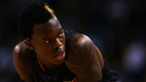 BOSTON, MA - DECEMBER 18:  Dennis Schroder #17 of the Atlanta Hawks looks on during the second quarter against the Boston Celtics at TD Garden on December 18, 2015 in Boston, Massachusetts.NOTE TO USER: User expressly acknowledges and agrees that, by downloading and/or using this photograph, user is consenting to the terms and conditions of the Getty Images License Agreement.  (Photo by Maddie Meyer/Getty Images)