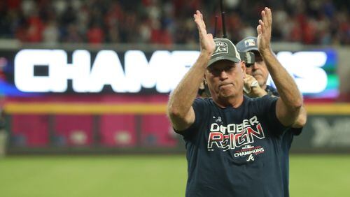 Braves manager Brian Snitker celebrates. (JASON GETZ/SPECIAL TO THE AJC)