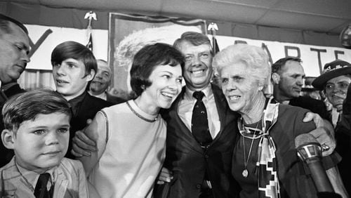 1970: Four years later, Jimmy Carter would be elected governor on his second try. Here, he celebrates on election night with Rosalynn and his mother Miss Lillian. (Billy Downs / AJC Archive at the GSU Library AJCN089-019b)