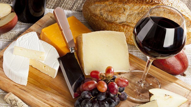 Cheese paired with alcohol, whether beer, whiskey, or wine, is a match made in heaven. (Fotolia)