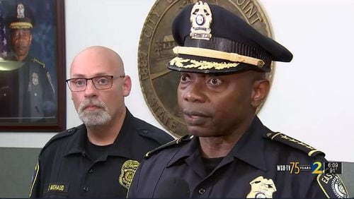 East Point police Chief Shawn Buchanan (right) speaks to the media after a child's body was found that investigators believe is likely to be missing DeKalb County 2-year-old J'Asiah Mitchell.