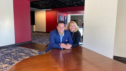 Anthony Rodriguez and Ann-Carol Pence inside the new Aurora Theatre facility.