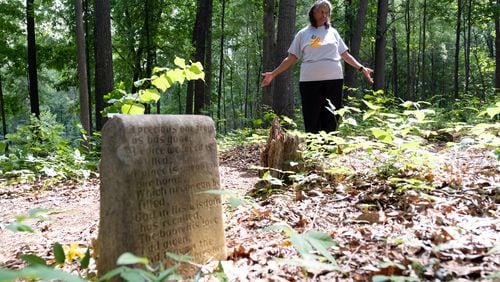 Francine Wilkins has many of her relatives, back to her great, great grandfather, buried in the Old Ebenezer Cemetery in Marietta. She is working to restore the cemetery, which has been neglected over the years and only has one intact headstone still standing. Photographed on Friday, July 14, 2023. (Ben Gray / Ben@BenGray.com)