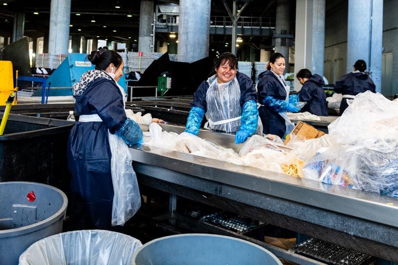 Workers sort waste at Mercedes-Benz Stadium in Atlanta, Georgia, on Monday October 17, 2022. Photo by Mitch Martin/ Courtesy of Mercedes-Benz Stadium.