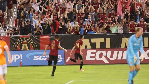 Miguel Almiron celebrates scoring a goal against Houston. (Atlanta United)