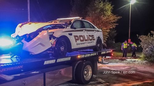 A Gwinnett County police cruiser caught fire on Ga. 124  and Sugarloaf Parkway, according to officials.